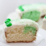 Green & White Cake - Slice with Cake behind