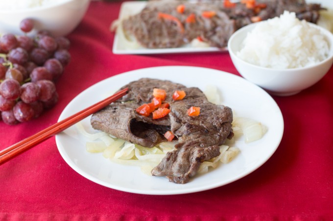 Chinese Steak served with onions and rice